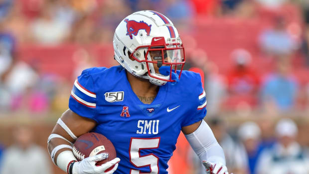 Oct 5, 2019; Dallas, TX, USA; SMU Mustangs running back Xavier Jones (5) runs the ball to the outside during the first quarter against Tulsa Golden Hurricanes at Gerald J. Ford Stadium. Mandatory Credit: Timothy Flores-USA TODAY Sports